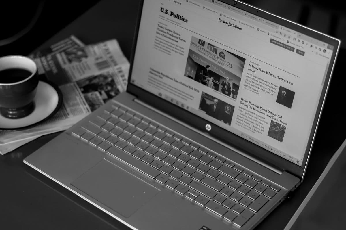 Reading the news on a laptop