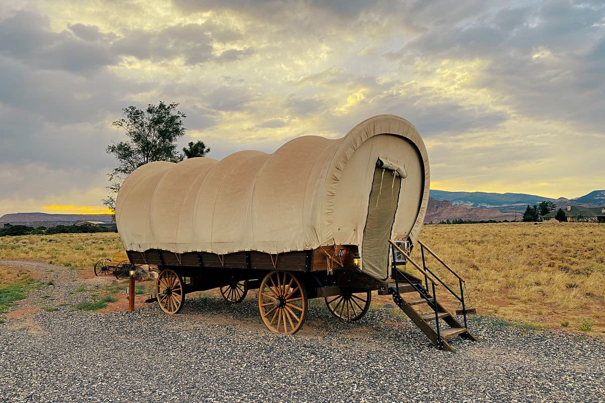 A desert wagon trail at dusk